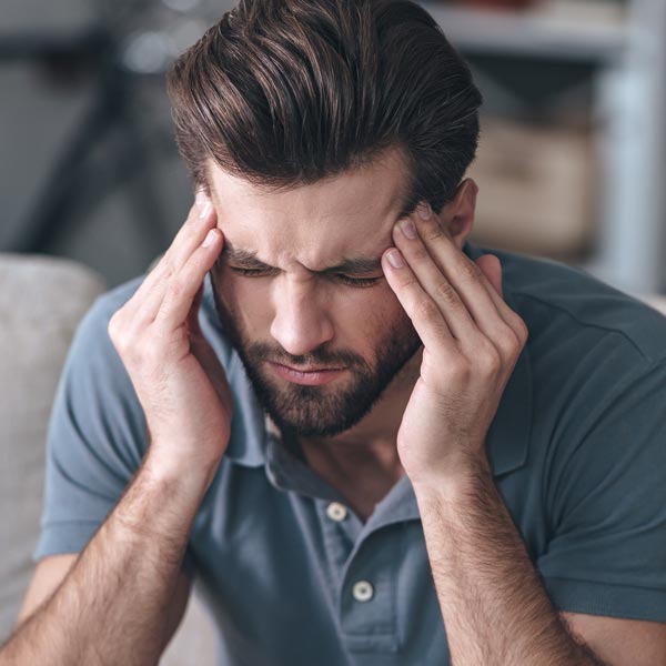 man with headache