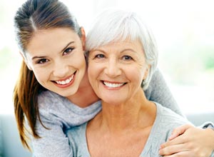 smiling mother and daughter
